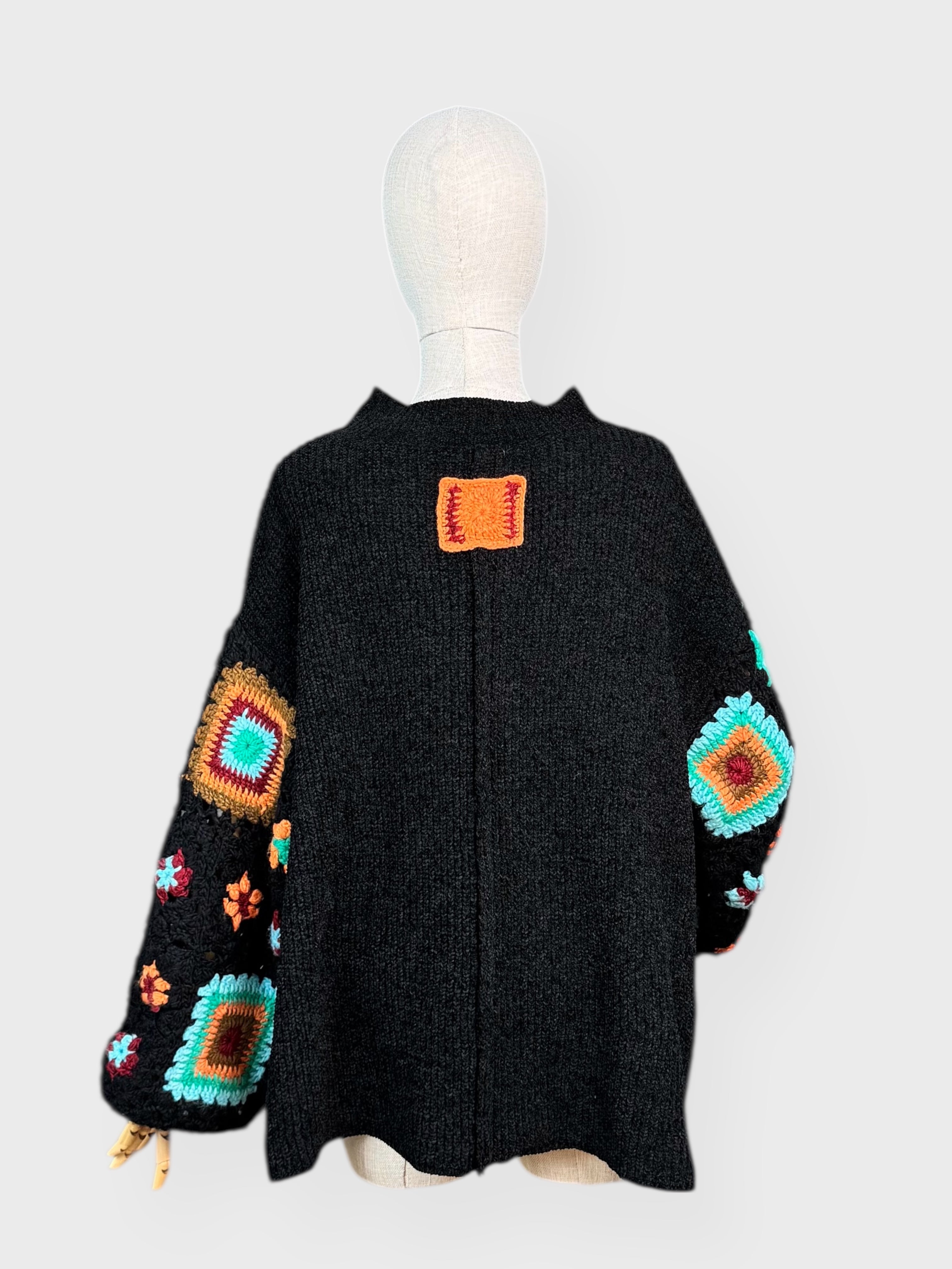 Black sweater with multicolored patchwork crochet sleeves, Pol, M
